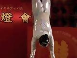 GORGEOUS CHINESE GIRL PERFORMING DEATH DEFYING STUNT